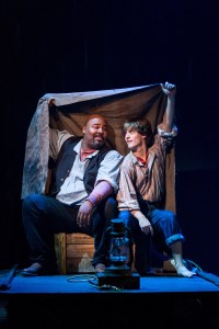 Jim (James Monroe Iglehart) and Huck (Alex Goley) escape down the Mississippi River in Theatreworks Silicon Valley's production of "Big River," through Dec. 30th. (Photo by Mark Kitaoka)