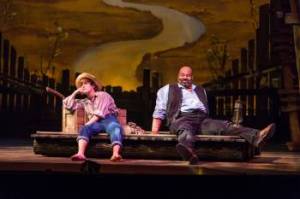 Huck (Alex Goley) and Jim (James Monroe Iglehart) escape down the Mississippi in TheatreWorks' production of "Big River" in Palo Alto (Photo by Mark Kitaoka)