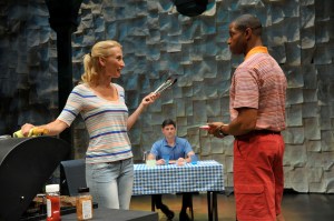 Man (Gabriel Marin, c) looks on as Woman (Carrie Paff) and her husband Cody (Aldo Billingslea) get into another argument in "This is How it Goes." (Photo by David Allen)