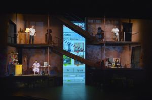 Erik Flatmo's multiple-leveled set allows for the many storylines to move through the space in "Water by the Spoonful." (Photo by Kevin Berne)