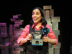 Polaroid Phillie (Marga Gomez) captures the daily love of many in Gomez' solo show "Lovebirds," playing weekends at the Marsh in Berkeley (Marga Gomez photo)